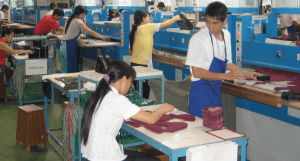 Shoe Parts being cut, sports shoe manufacturing process
